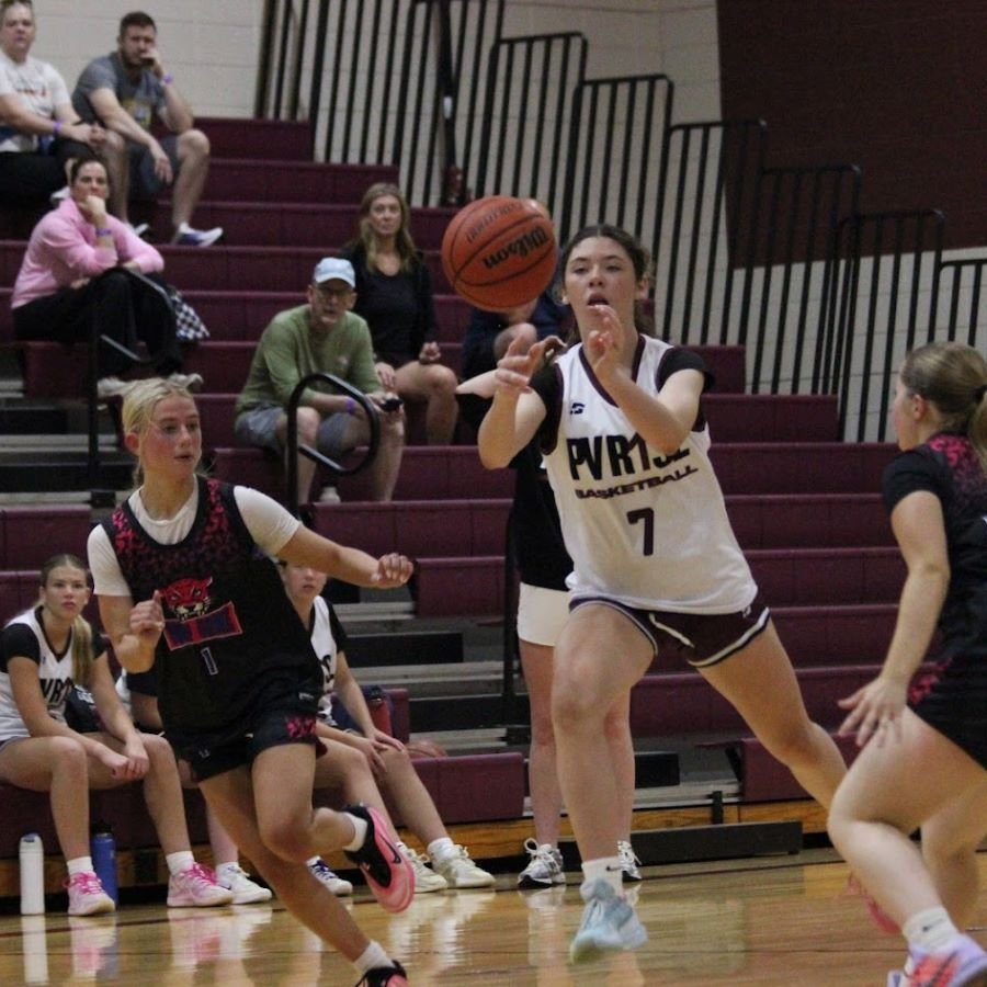 PVRise-Player-Passing-Ball-with-Crowd-in-background-900×900